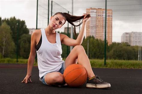 Sexy Woman Holding Basketball In Hand Stock Photo By Maxsaf