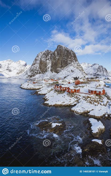 Hamnoy Village In Lofoten Islands With High Mountains In The Background