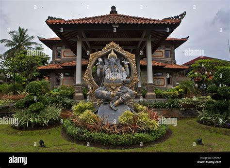 Balinese Carved Stone Statue Of Ganesh In Hindu Temple