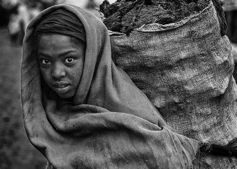 Ethiopian Girl Carrying Manure Photograph By Joxe Inazio Kuesta