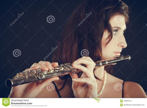 Woman Playing Transverse Flute On Black Stock Photo Image Of