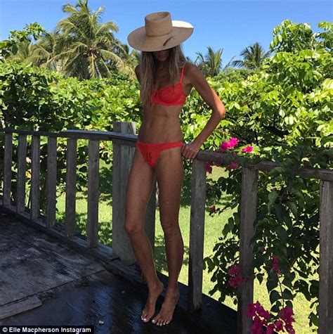 Elle Macpherson Forgoes Bikini Bottoms For Racy Swim Daily Mail Online