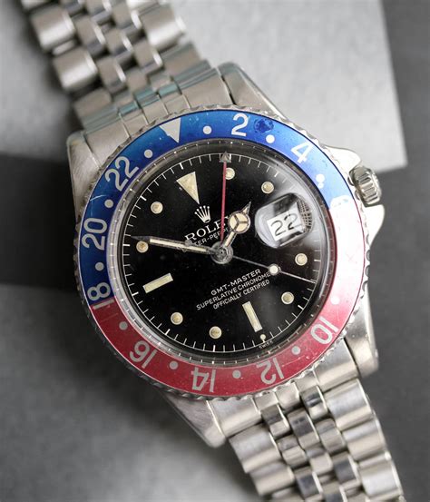Greenwich mean time used to be the most popular time reference. Rolex GMT Ref. 1675, gilt dial 1961 - Rolex Passion Market