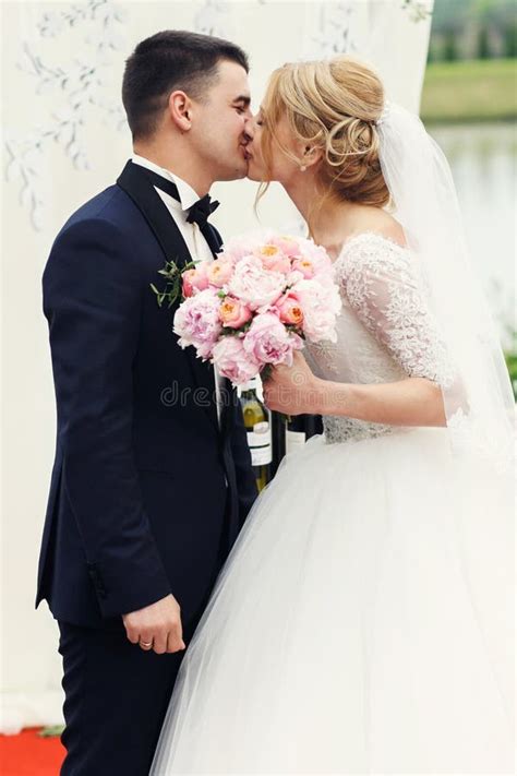 Handsome Happy Groom And Beautiful Blonde Bride In White Dress K Stock
