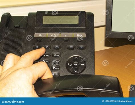 Dialing Number A Phone In A Office By Man Hand Stock Image Image Of
