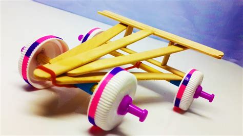 How To Make A Rubber Band Powered Car With Popsicle Sticks Youtube