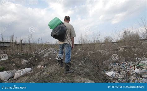 Homeless Man Standing On Garbage Hill At Dump Site Stock Video Video