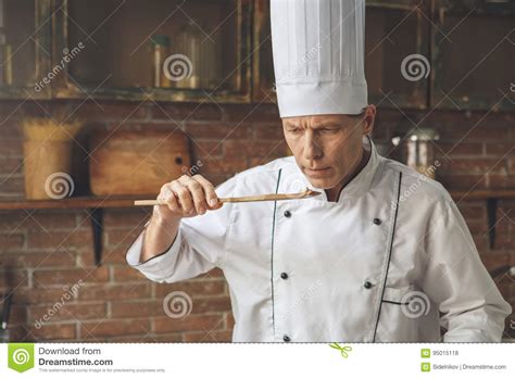 Mature Man Professional Chef Cooking Meal Indoors Stock Photo Image