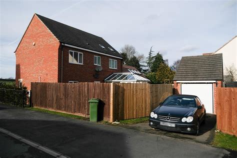 A house plan without a garage is a great idea if you want the extra square footage to be used to extend the interior living space of the home. Couple secretly hid house behind garage door to flout ...