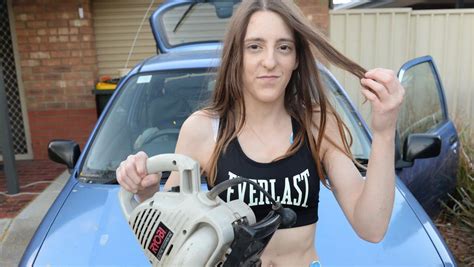 Young Woman Relieved After Getting Hair Stuck In Leaf Blower While