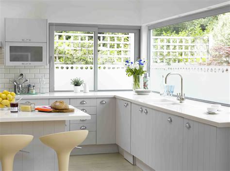 If you have multiple windows in your kitchen, consider using the windows to frame a distinctive feature, such as the range hood. Window Treatments For Kitchen Ideas - HomesFeed