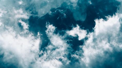 Download Wallpaper 1366x768 Clouds Sky Porous Blue