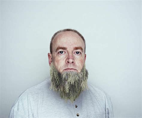 Caucasian Man Wearing Tree Beard Stock Photo