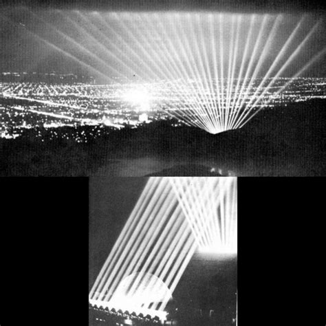 A Line Of Searchlights Originating At The Hollywood Bowl Comb The Sky