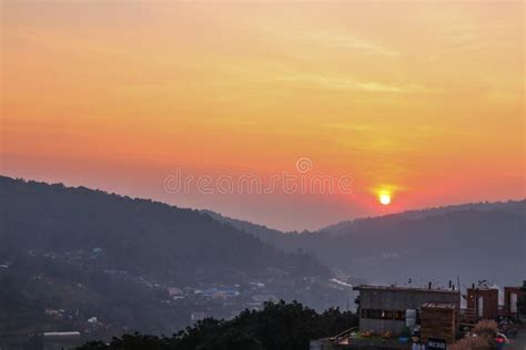 Colorful Sunset Over The Mountain Hills In A Thai Village Near