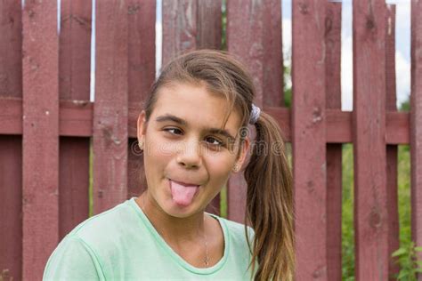 Beautiful Teenage Girl Showing Tongue Stock Image Image Of Beautiful Long 58807591
