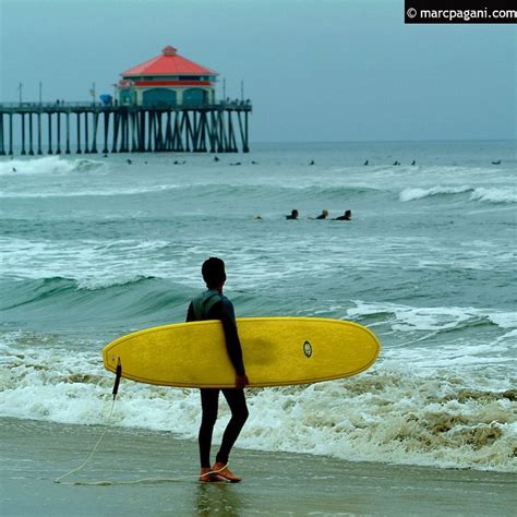A Surfer At Manhattan Beach California Manhattanbeach S Flickr