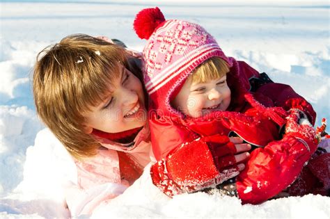 Children Playing In Snow Stock Image Image Of Smiling 416559