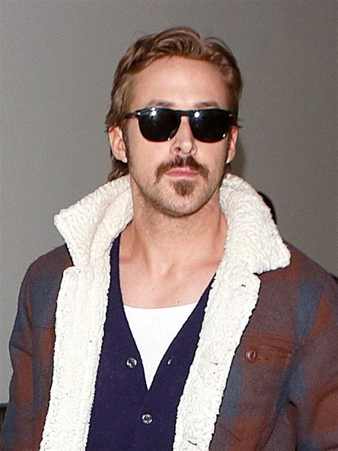A Man Wearing Sunglasses And A Jacket