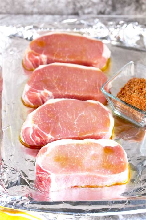 Easy baked pork chops with four ingredients: Easy Oven Baked Pork Chops | Lemon Blossoms