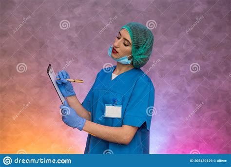 Doctor Holding Clipboard With Pen Pretty Woman In Medical Form Smiling