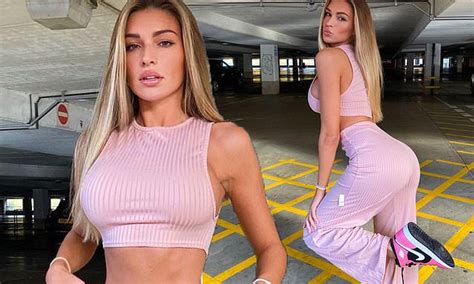 Zara Mcdermott Showcases Her Washboard Abs In A Pastel Pink Crop Top As
