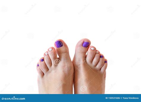 Closeup Photo Of A Beautiful Female Feet With Pedicure Isolated On