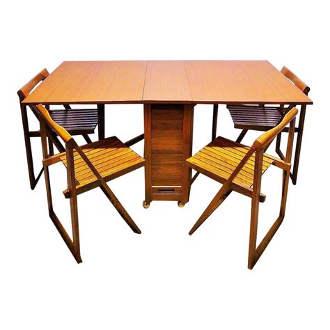 Maybe you would like to learn more about one of these? Mid Century Modern Teak Gatefold Hideaway Folding Table ...