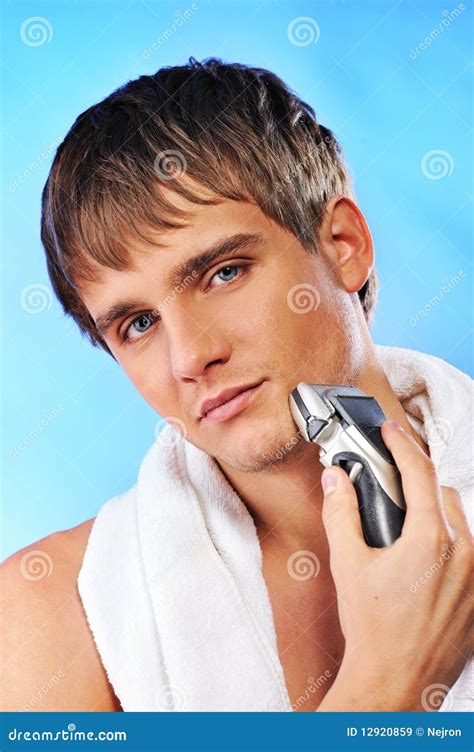 Handsome Young Man Shaving Stock Image Image Of Portrait 12920859