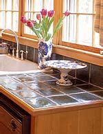 From types of wood to maintenance, our experts help you weigh your the majority of wood countertops are made from traditional butcher block, and while they may see. Ceramic tile with wood trim | Tile countertops kitchen ...