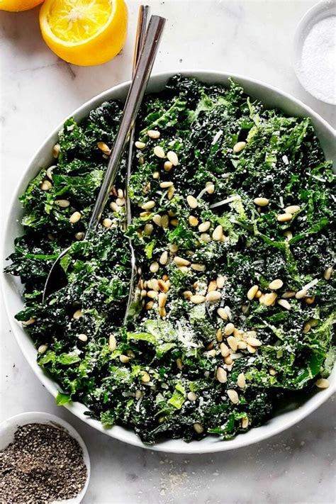 the best kale salad with parmesan and pine nuts foodiecrush