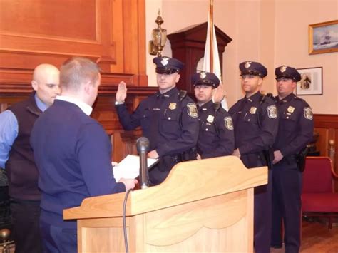 Four New Police Officers Sworn In At City Hall