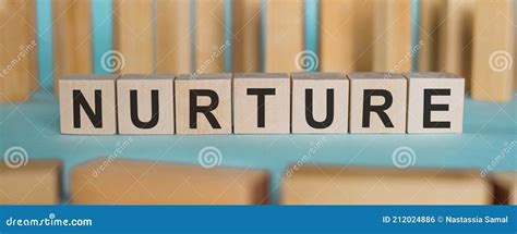 Nurture Word Written On Wooden Cubes Stock Photo Image Of Message