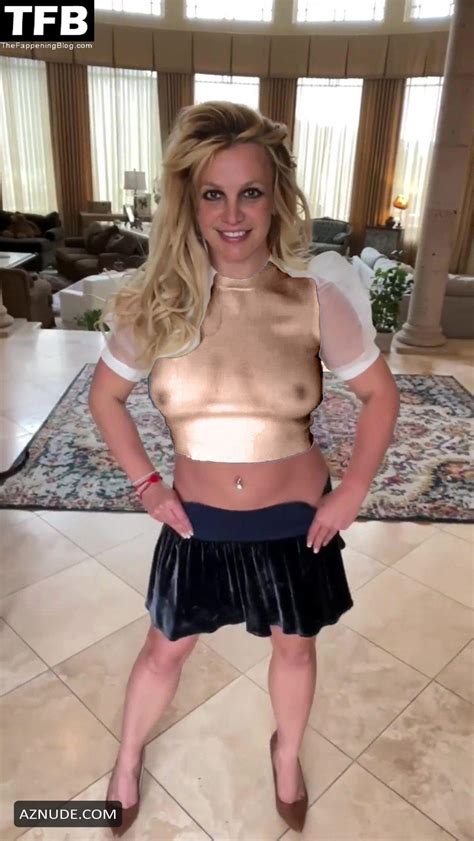 Britney Spears Sexy Poses Braless Flaunting Her Tits In A See Through