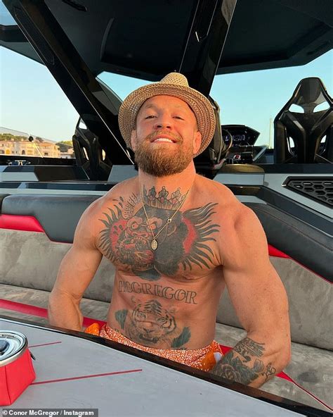 shirtless conor mcgregor playfully flexes his muscles during ibiza getaway daily mail online