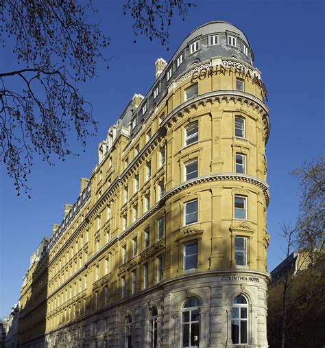 the exterior of corinthia hotel london whitehall place to the left and northumberland avenue to