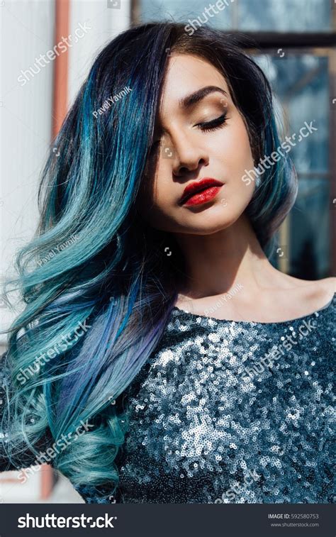 Fashion Portrait Of Gorgeous Girl With Blue Dyed Curly Hair Long The