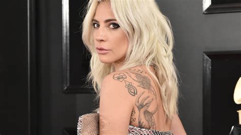 Lady Gaga Gets La Vie En Rose Back Tattoo Tribute To A Star Is Born Allure