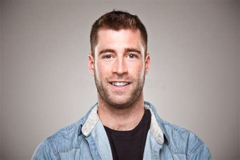 Portrait Of A Normal Man Smiling Over Grey Background Stock Photography