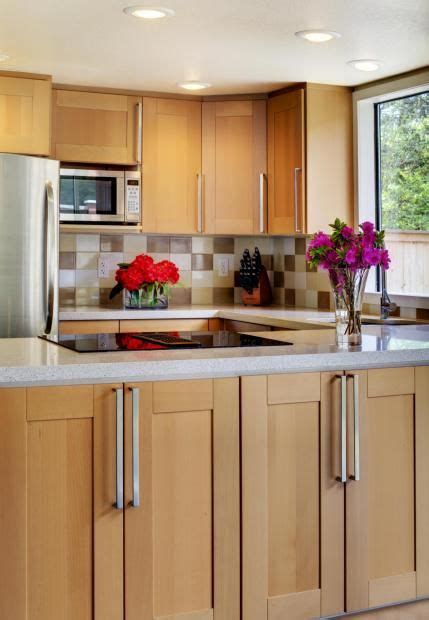 No doubt kitchen cabinets made from maple works out best with other contrasting materials. maple cabinets w white countertops | Kitchen remodel ...
