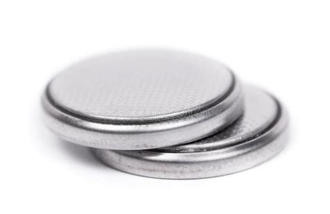 Flat Lithium Round Button Cell Battery Isolated Over White Stock Image