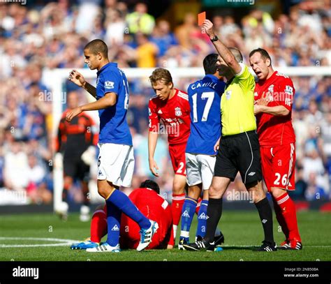 Evertons Jack Rodwell Left Is Shown A Red Card By Referee Martin