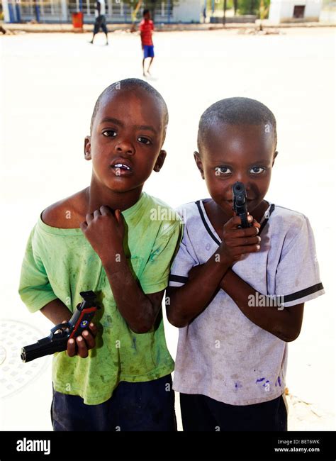 Young Kids Playing With Toy Guns Namibia Stock Photo Alamy