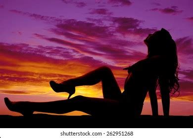 Silhouette Woman Sitting Outdoors Her Bikini Stock Photo 262951268