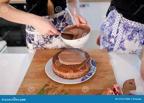 Young Woman Cooking A Cake In The Kitchen Stock Photo Image Of Boss