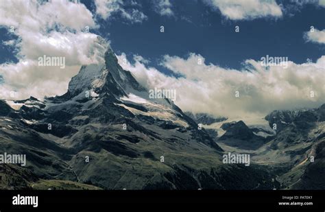 The Iconic Peak Of The Matterhorn Seen From Valais Showing Banner