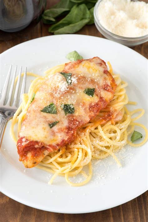 Spread around the bottom of the roasting pan and place the chicken on top. Easy Chicken Parmesan Recipe | Crazy for Crust