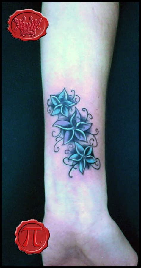 27 Glorious Wrist Flower Tattoos And Designs