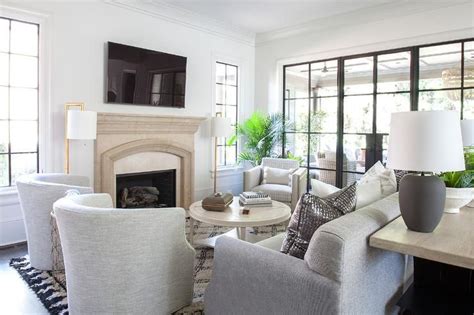 A sofa + 2 chairs start with a great sofa, then place a pair of chairs across from it. Stunning gray living room features a gray sofa placed on a ...