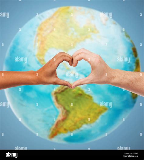 Human Hands Showing Heart Shape Over Earth Globe Stock Photo Alamy
